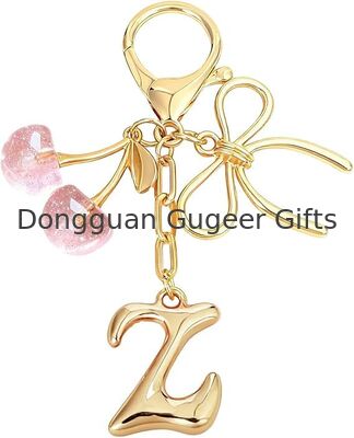 GUGEER Bubble Original Keychain with Bow & Cherry - كيس الحروف الذهبية السحر للنساء